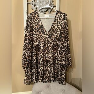 Flowy Cheetah sprint long sleeve blouse